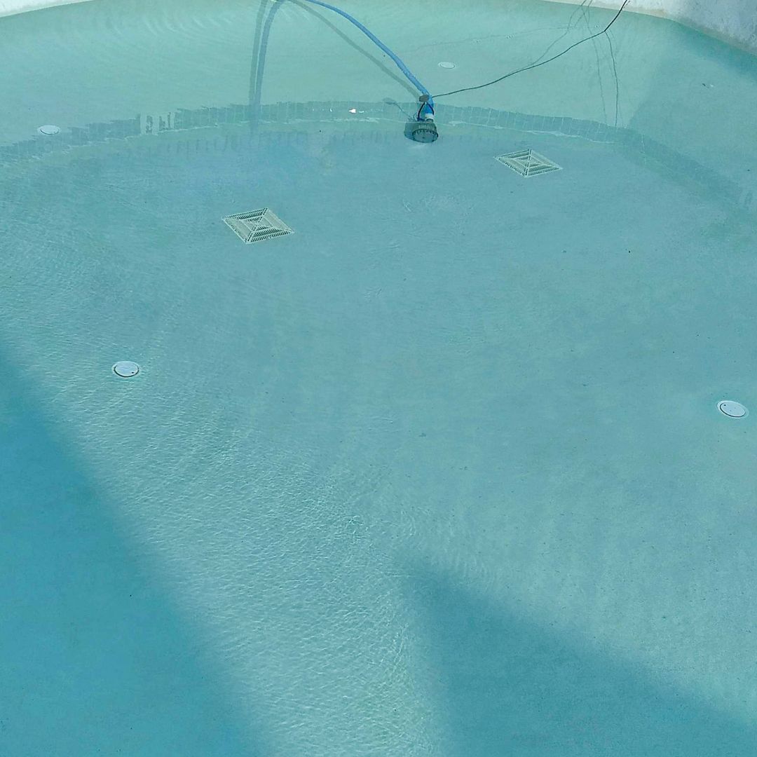Pool with pool equipment inside. The importance of proper winterization techniques.