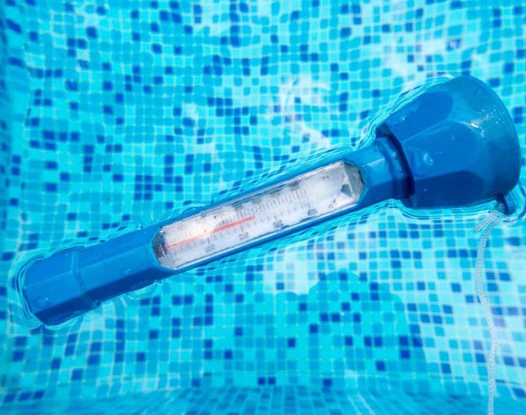 Thermometer in pool water